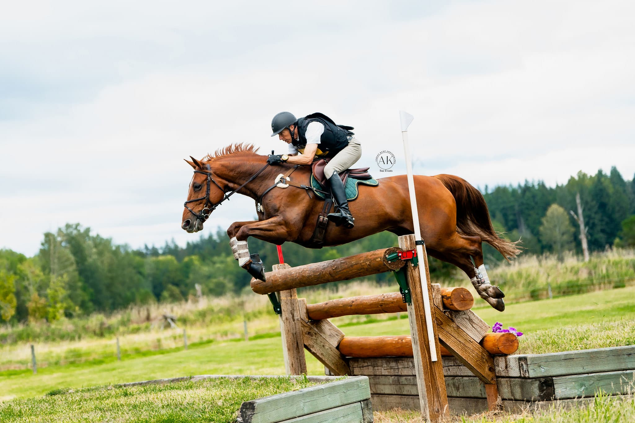 Todd Trewin and Cooley High Society jumping cross-country